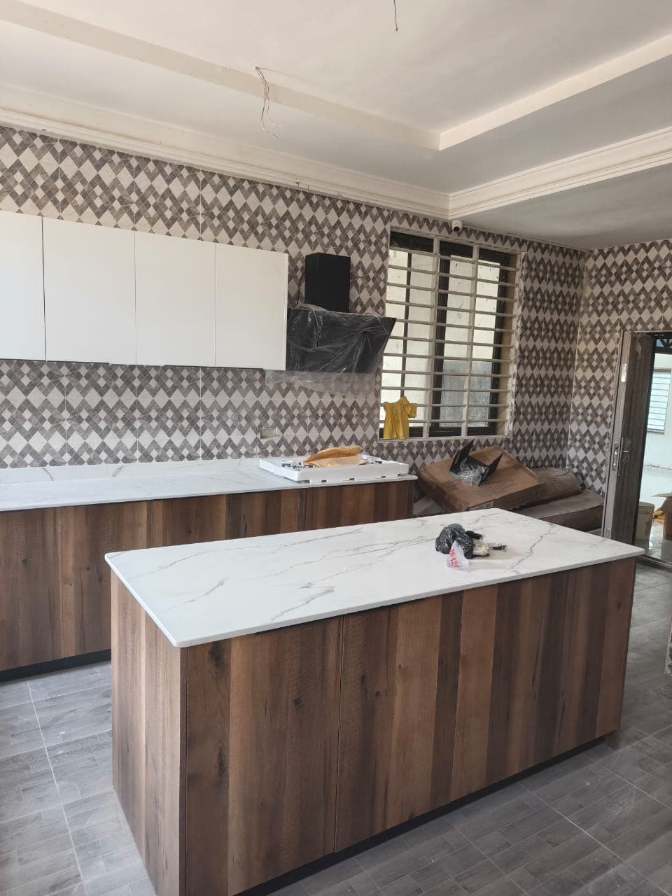 Kitchen island with marble top and wood finish — Tech1 Wood Works Accra